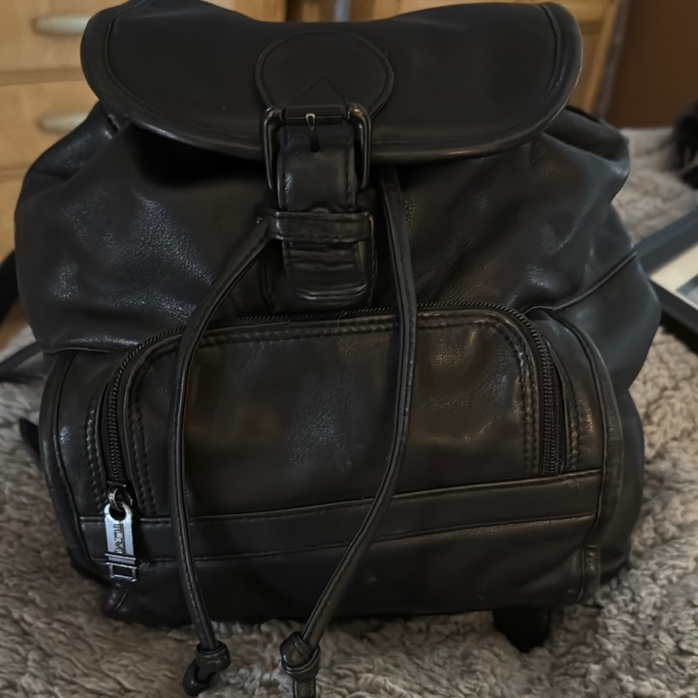 TUMI Black Genuine Leather Small Backpack
